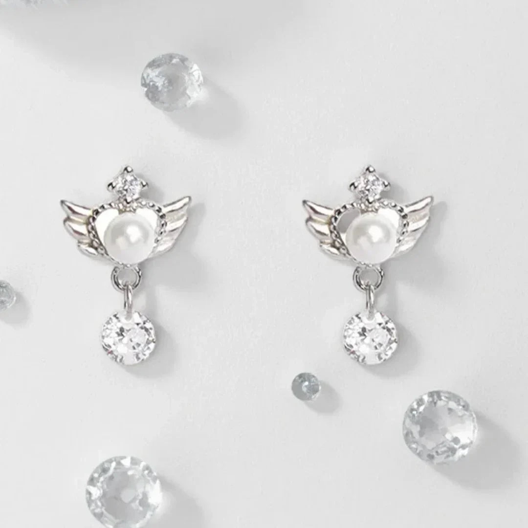 Dangling angel wing earrings
