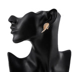 Angel wing dangling earrings with rhinestones