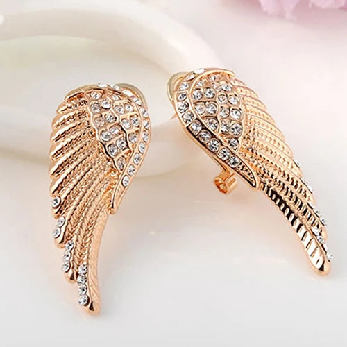 Angel wing dangling earrings with rhinestones gold
