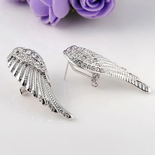 Angel wing dangling earrings with rhinestones silver