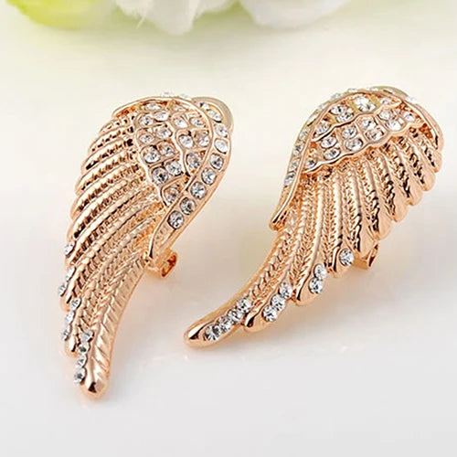 Angel wing dangling earrings with rhinestones gold