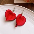 Dangle Earrings with Red Colored Leaf