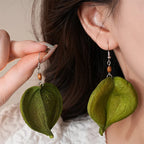 Dangle Earrings with Green Colored Leaf