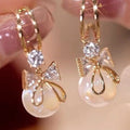 Drop Earrings with Bow Tie and Pearl