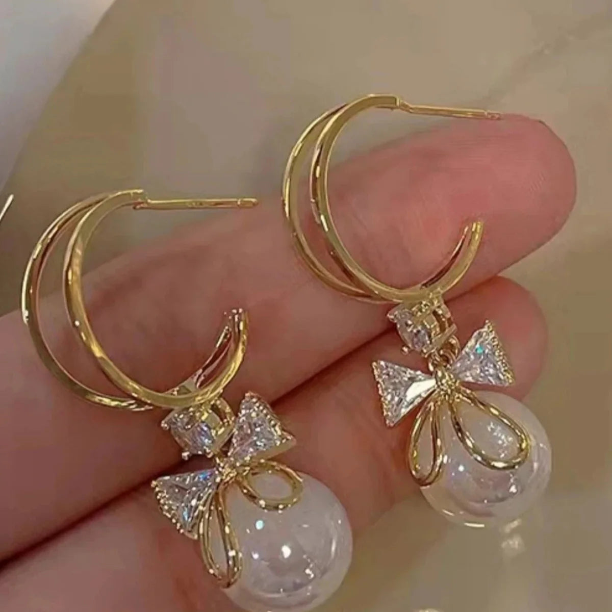 Drop Earrings with Bow Tie and Pearl