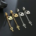 Gold key and lock dangle earrings