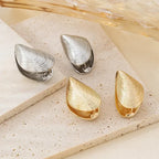 Gold Mussel Shell Dangle Earrings