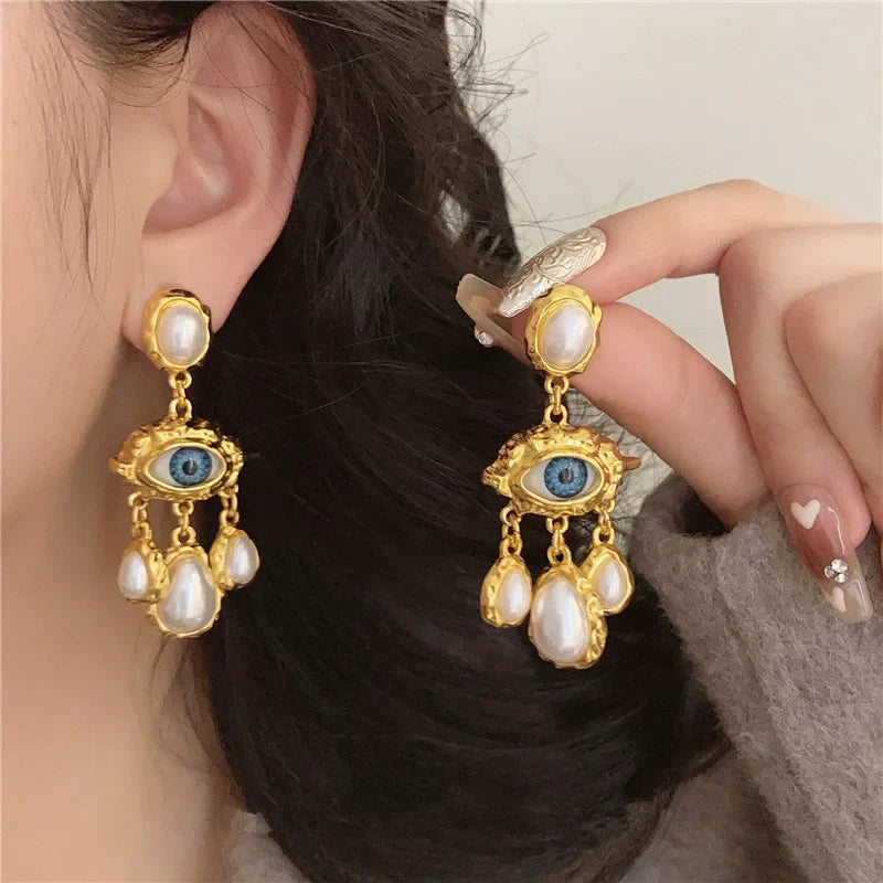 Blue Eye and Pearl Drop Earrings gold