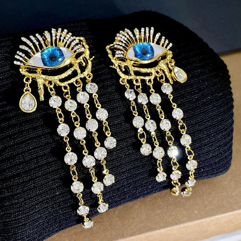 Blue Eye and Rhinestone Dangle Earrings