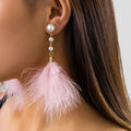 Dangling Pearl and Feather Earrings 1