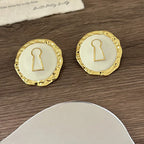 Round earrings key white