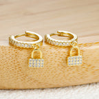 Key and lock hoop earrings with rhinestone gold