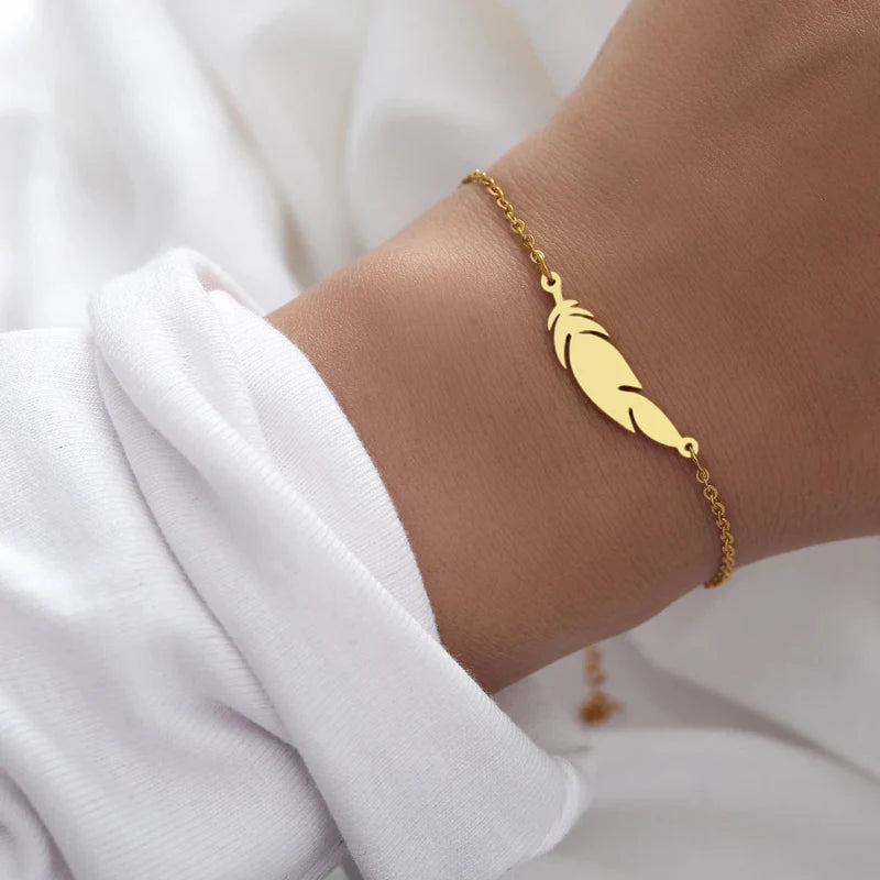Charm Bracelet with Gold Feather