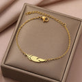 Charm Bracelet with Gold Feather