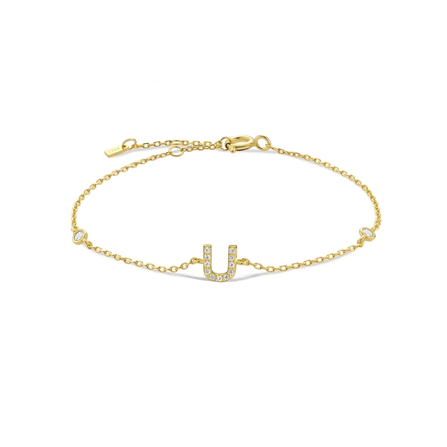 Bracelet with gold rhinestone initial u