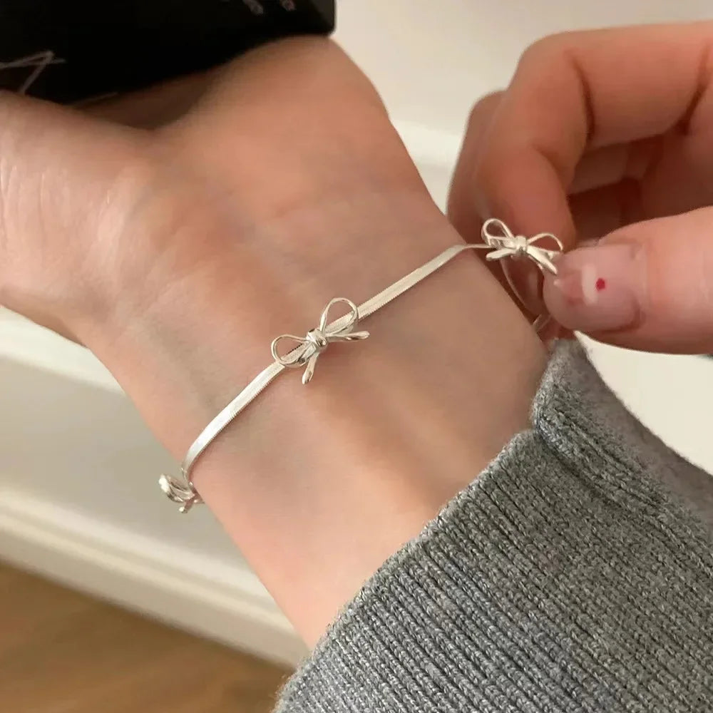 Silver bow bracelet for women

