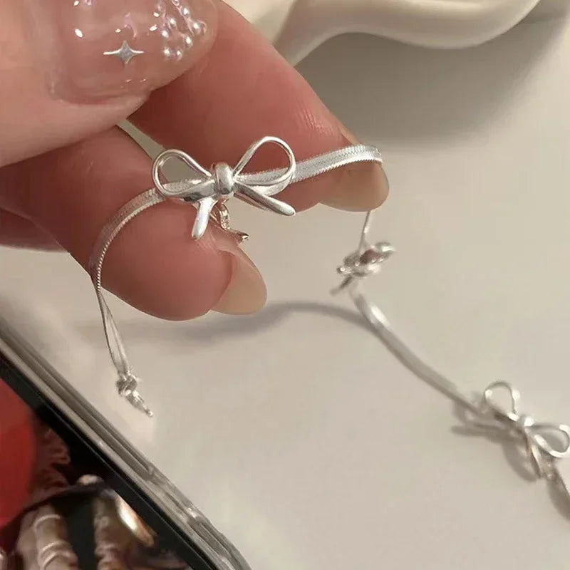Silver bow bracelet for women
