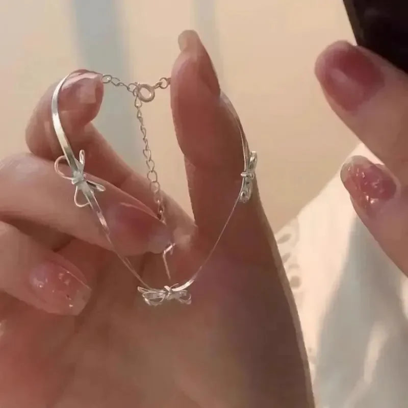 Silver bow bracelet for women
