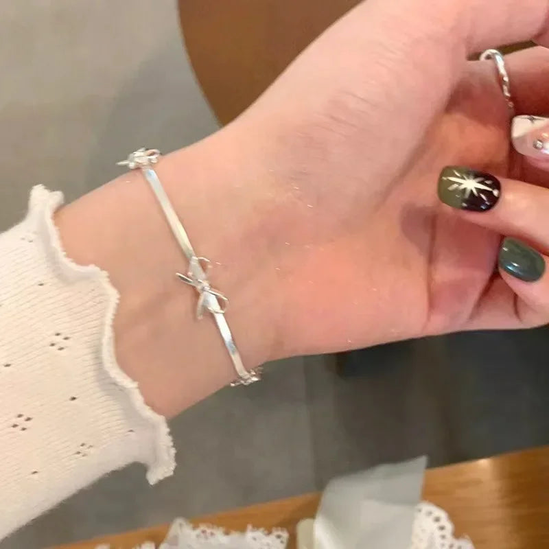 Silver bow bracelet for women