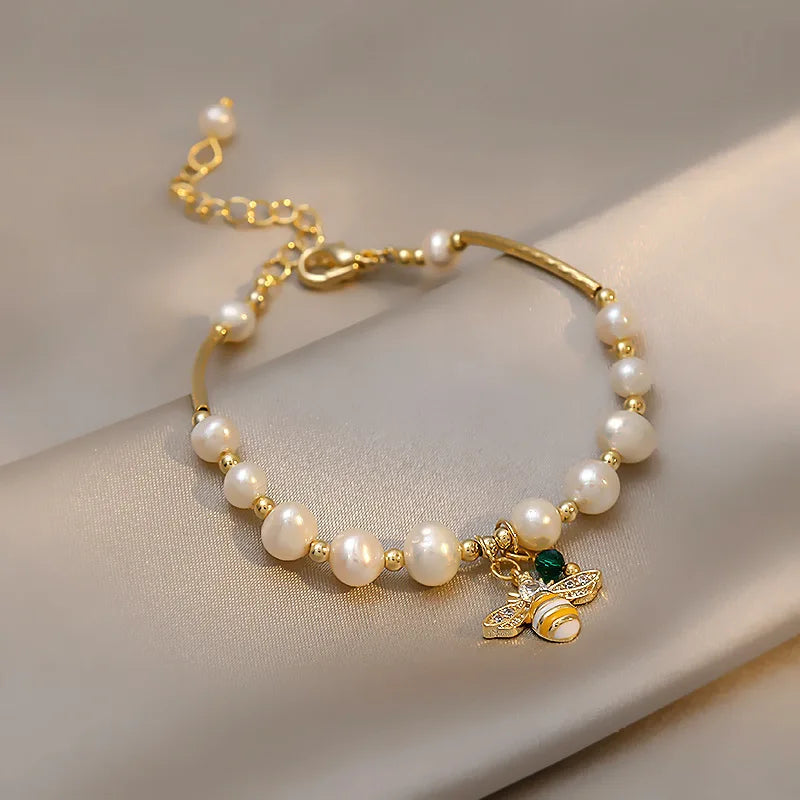 Bracelet with white beads bee