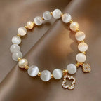 Pearl Bracelet with 4-Leaf Clovers
