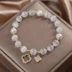 Pearl Bracelet with 4-Leaf Clovers