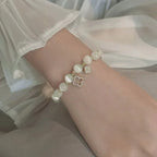 Pearl Bracelet with 4-Leaf Clovers
