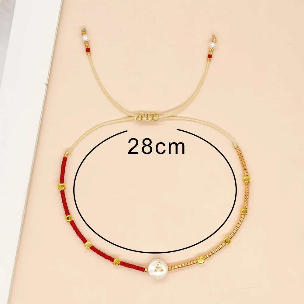 Bicolor initial bracelet