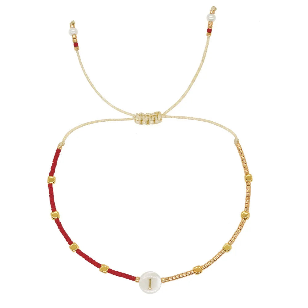 Bicolor initial bracelet i