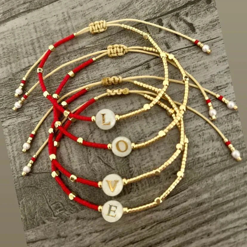 Bicolor initial bracelet o