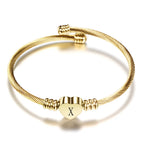 Heart bracelet with initial gold x