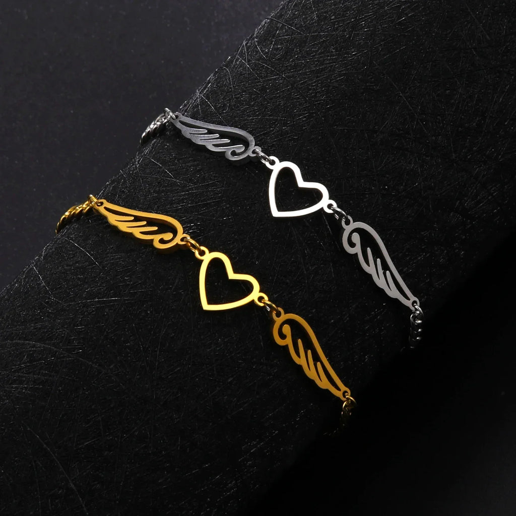 Gold heart and angel wings bracelet