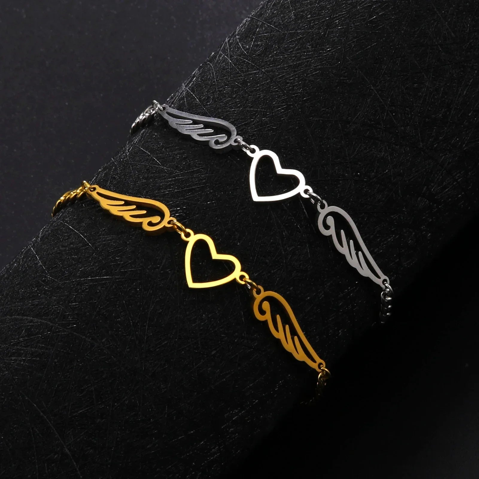 Gold heart and angel wings bracelet