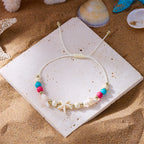 Cord bracelet with shell and white starfish star