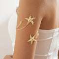 Boho arm bracelet for women - gold starfish bicep chain