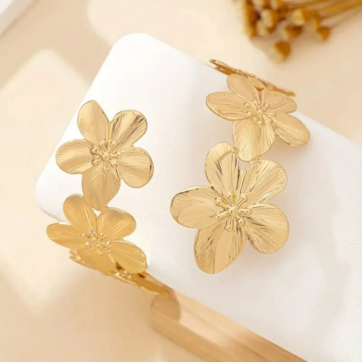 Women's arm bracelet - gold flower petal biceps chain