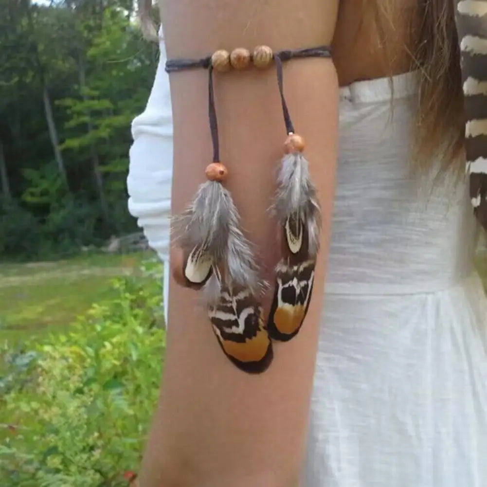 Women's arm bracelet with feather - bicep chain