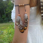 Women's arm bracelet with feather - bicep chain