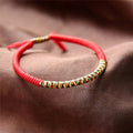 Tibetan Good Luck Bracelet in Red Cotton