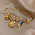 Gold Shell Charm Bracelet