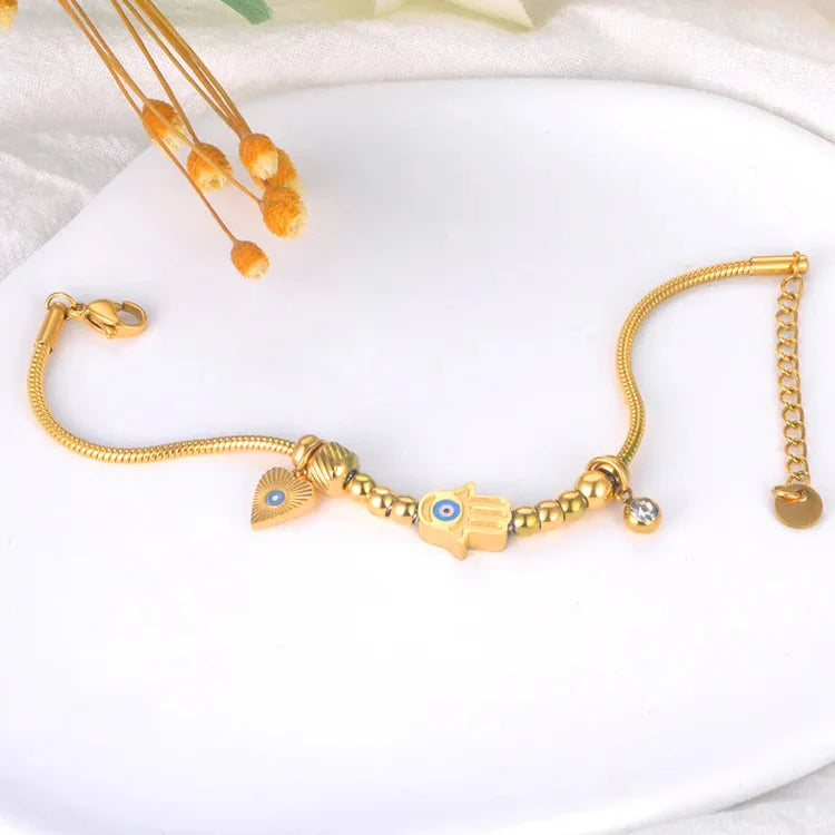 Protection Bracelet with Hamsa Hand and Blue Eye Gold