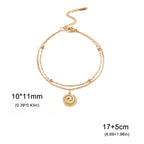 Gold bracelet with small spiral charm