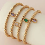 Gold bracelet with birthstone for women