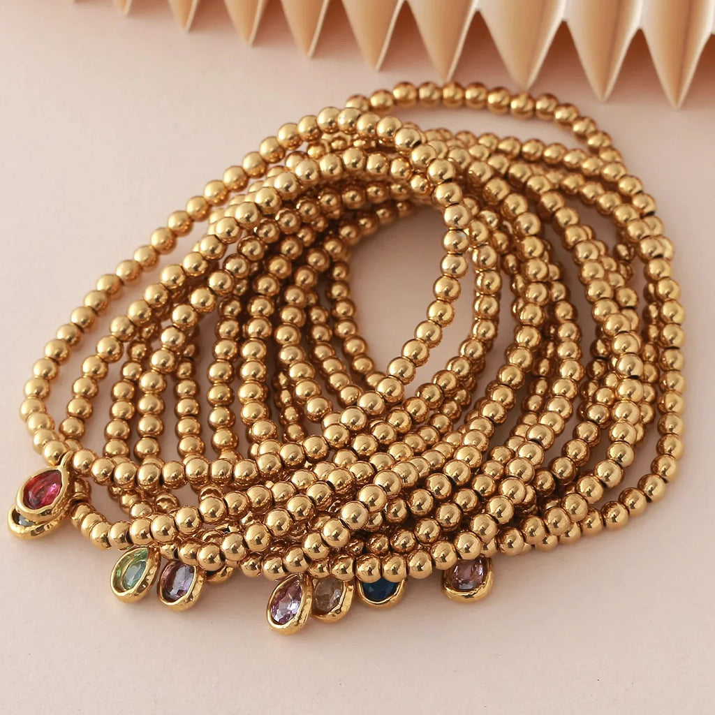 Gold bracelet with birthstone for women