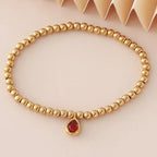 Gold bracelet with birthstone for women