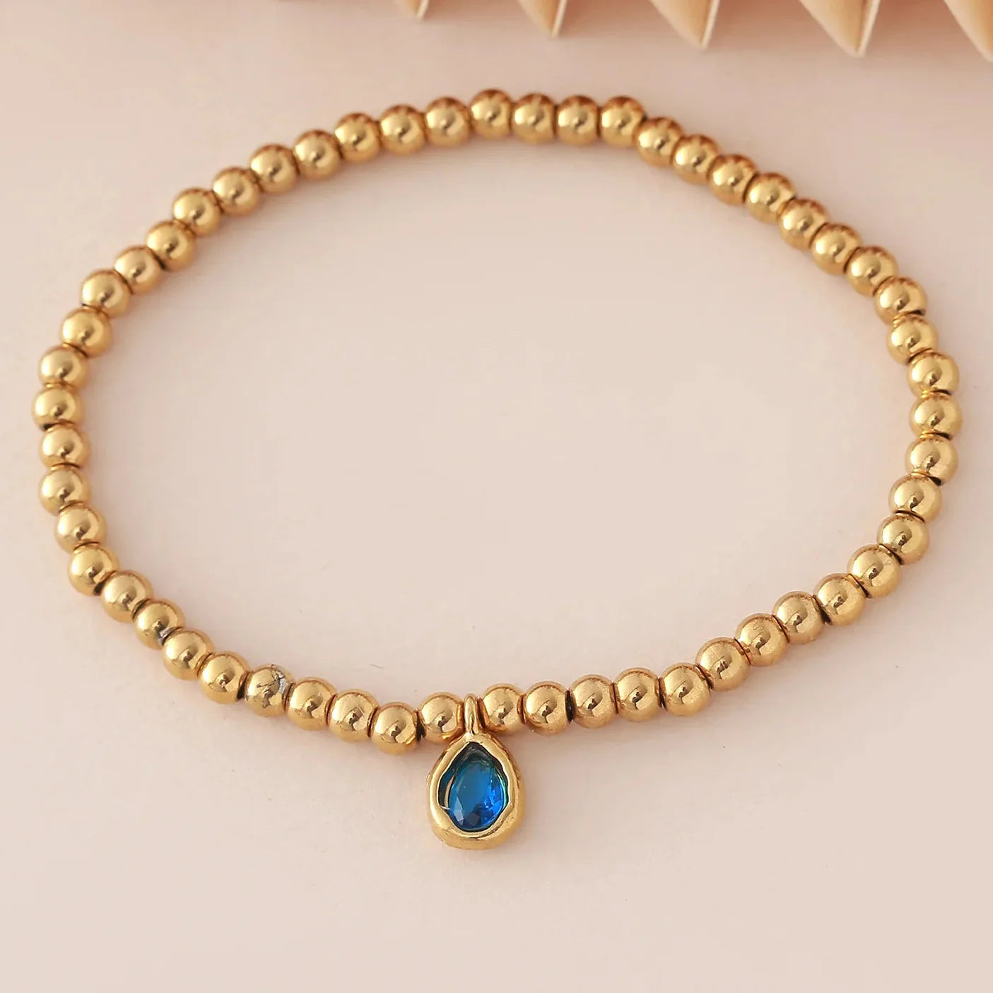 Gold bracelet with birthstone for women