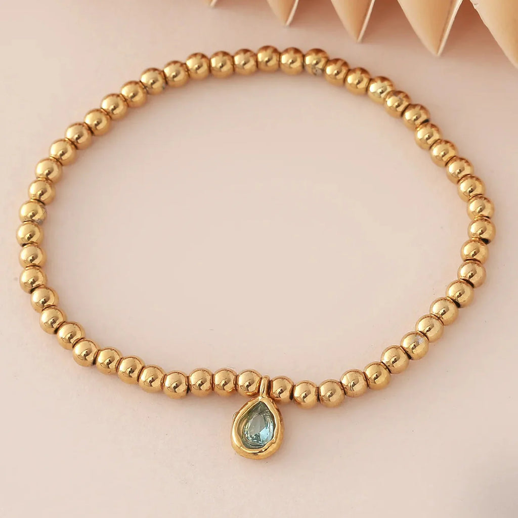 Gold bracelet with birthstone for women