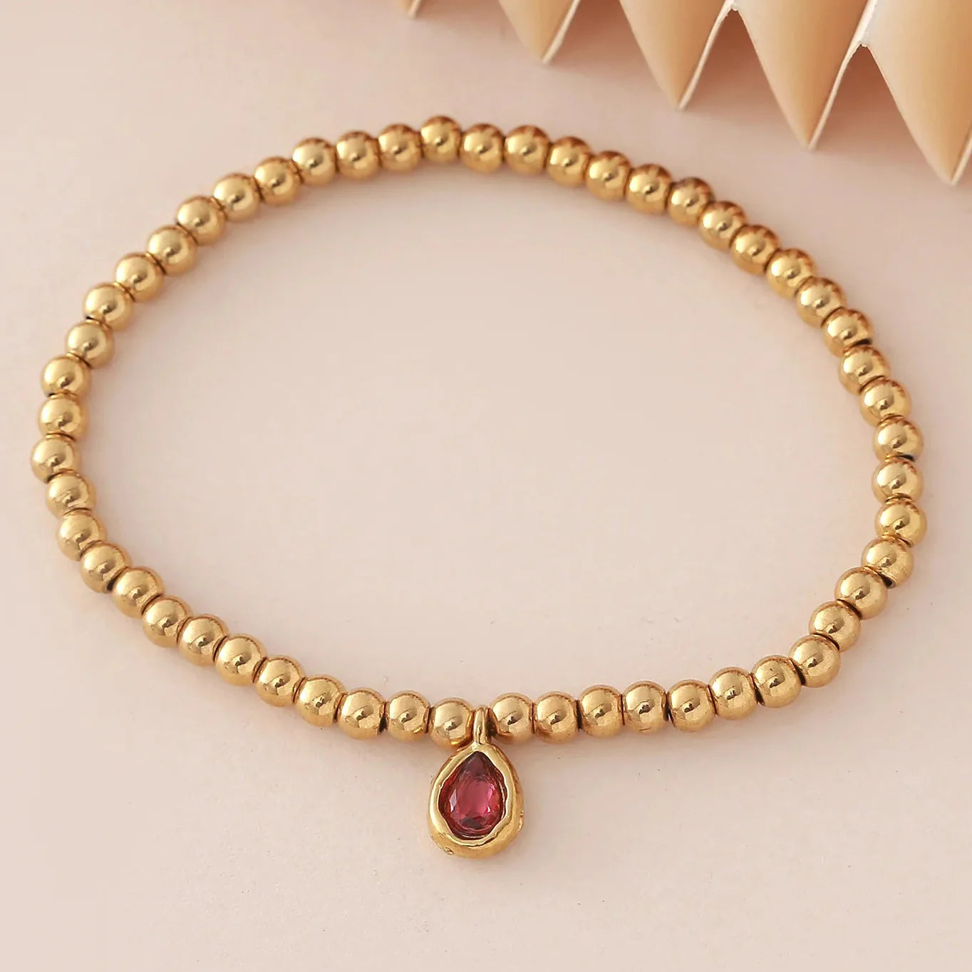 Gold bracelet with birthstone for women