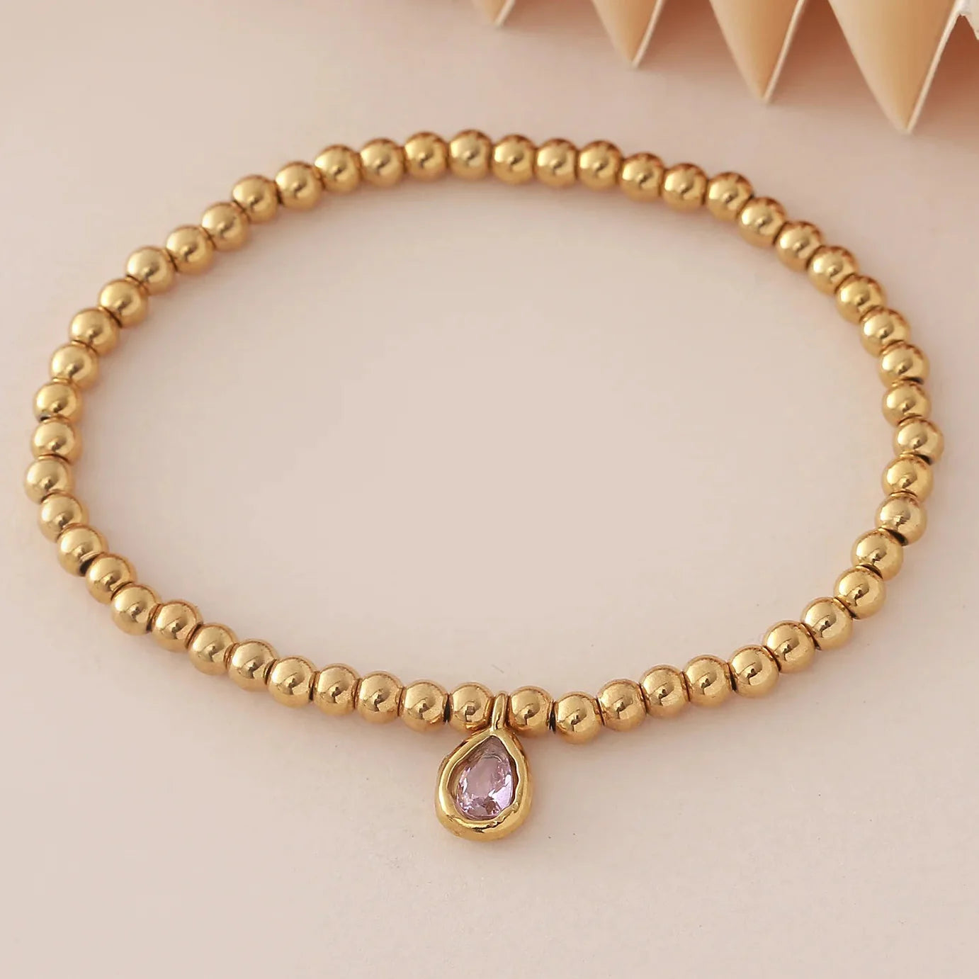 Gold bracelet with birthstone for women