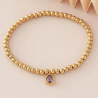 Gold bracelet with birthstone for women